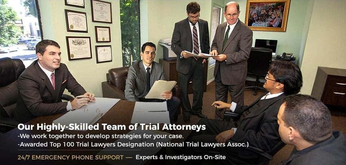 Attorneys at the Law Offices of David S. Chesley gathered around a conference table.